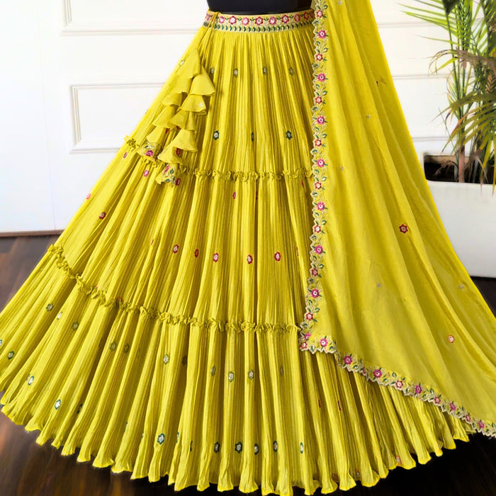 Yellow color Crush & Mirror Embroidery work Ruffle Style Lehenga Choli for any function